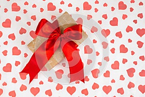 Valentine`s Day. Presented as a red ribbon on a white paper with red hearts