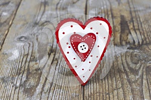 Valentine`s Day. red heart on the background of old boards