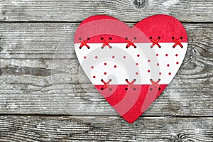 Valentine`s Day. red heart on the background of old boards