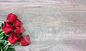 Valentine`s Day Red Roses Over Wood Background