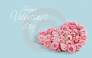 Valentine`s day romantic greeting card. Composition with a heart of pink roses on a blue background.Mothers day. 8 Marth. Banner