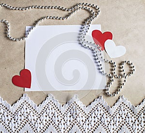 Valentine`s Day, romantic template, mock up with paper hearts, red bow ribbon, bead and white vintage lace in