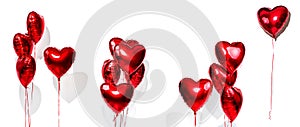 Valentine`s Day. Set of air balloons. Bunch of red heart shaped foil balloons isolated on white