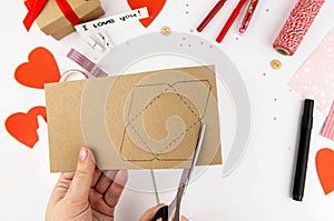 Valentine`s Day. Step by step instructions for making a gift for the holiday of lovers. Step 2 draw an envelope template and cut