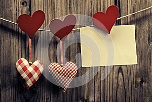 Valentine's Day wallpaper - Textile hearts hanging on the rope, message