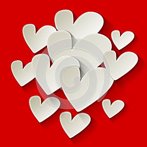 Valentine`s day white paper heart on a red background. photo