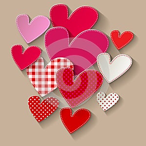 Valentine`s day white paper Pathwork hearts on a beige background.