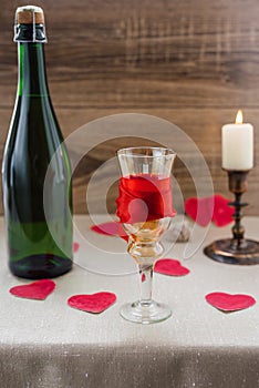 Valentine`s Day. wine, candles, small heart