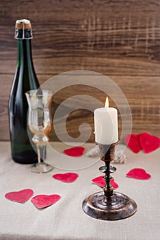 Valentine`s Day. wine, candles, small heart