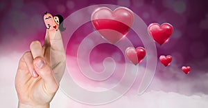 Valentine's fingers love couple and Shiny bubbly Valentines hearts with purple bokeh misty backgroun