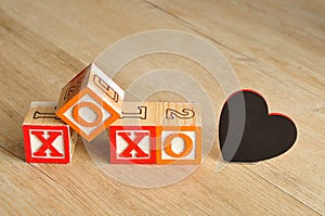 Valentine's Day.XOXO Spelled with colorful alphabet blocks