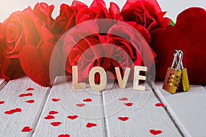 Valentines background with red rose, Heart shape, Wooden letters word