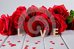 Valentines background with red rose, Heart shape, Wooden letters word