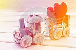 Valentines day background symbol. Two heart in toy train. Concept of love