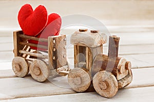 Valentines day background symbol. Two heart in toy train. Concept of love