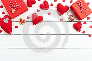 Valentines day background concept. Top view of Red gift box with handmade red heart