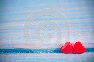 Valentines Day background with Fabric valentine heart on grunge wood table.Retro filter