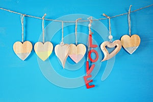 Valentines day background. hearts on wooden background