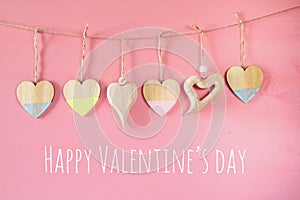 Valentines day background. hearts on wooden background