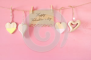 Valentines day background. hearts on wooden background