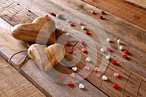 Valentines day background. hearts on wooden table