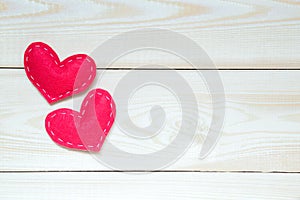 Valentines day background with hearts on the wooden table, top view