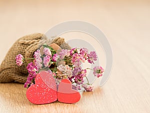 Valentines day background with red hearts on wood floor. Love and Valentine concept