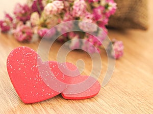 Valentines day background with red hearts on wood floor. Love and Valentine concept