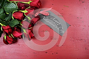 Valentines Day background with red roses with greeting card