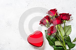 Valentines day background. Red roses and heart on white.