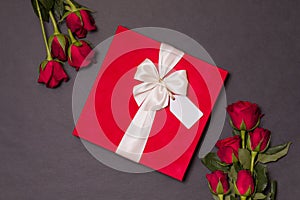 Valentines day background, romantic seamless black background,red rose bouquet,ribbon,gift tag,gift