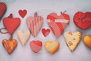 Valentines day background. Various of wooden and fabric hearts