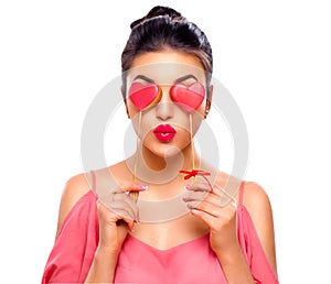 Valentines Day. Beauty girl with Valentine Heart shaped cookies in her hands