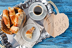 Valentines day breakfast with croissants and tea