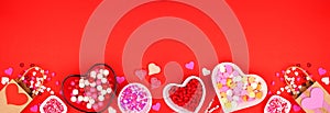 Valentines Day candy bottom border on a red banner background