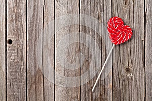 Valentines day candy heart on wooden table