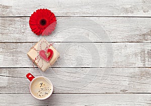 Valentines day card with gift, cup and flower