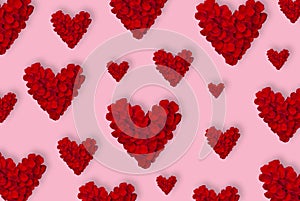 Valentines Day card with Heart Made of Red Roses petals Isolated on pink