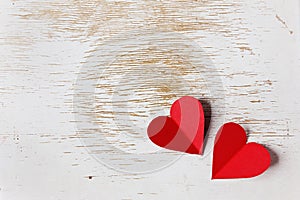 Valentines day card with hearts on a wooden background