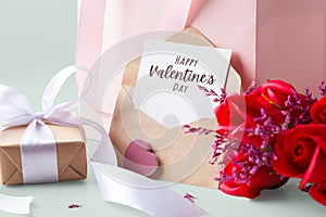 Valentines day card with kraft envelope, rose and gift box