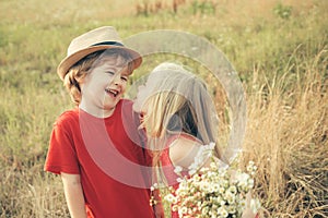 Valentines day concept. First love. The concept of child friendship and kindness. Kid having fun in spring field