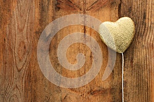 Valentines day concept. gold glitter hearts over wooden background. Flat lay composition