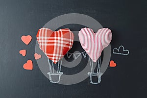 Valentines day concept with heart shapes as air balloons