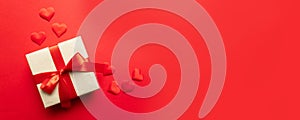 Valentines day concept. Red hearts on a red background. Flat lay, top view, copy space