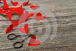 Valentines Day concept. Red hearts wooden background