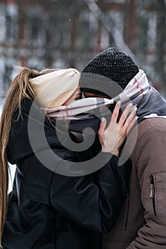 Valentines Day couple outdoors. Winter dating, Date Ideas to Cozy Up. Cold season dates for couples. Young couple in