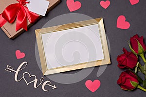 Valentines day,empty frame,love,black background,gift,red roses,hearts,message,free copy text space