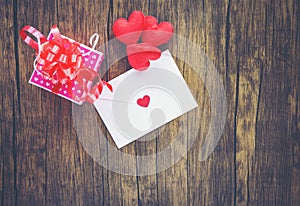 Valentines day gift box pink on wood Envelope love mail Valentine Letter Card with Red Heart Love concept