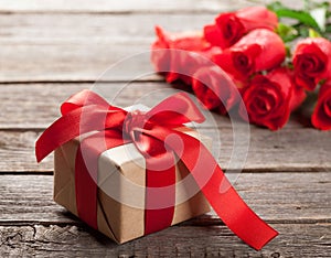 Valentines day gift box and red roses