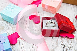 Valentines Day Gift Box With Ring On White Table Background